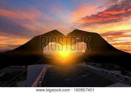 hand forming silhouette a heart shape with sunset light