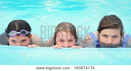 teen girl in swimming pool outdoor photo