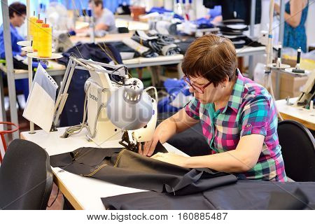 GUKOVO RUSSIA - SEPTEMBER 2016: Workers work in a garment factory