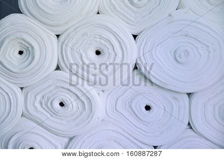 Sintepon. Insulation for clothing. Insulation material. The concept of sewing production.