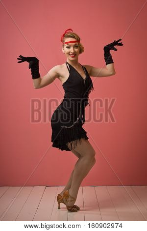 Pretty Actress In Black Retro Dress Dancing Charleston