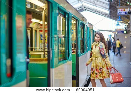Beautiful Young Woman Running To Catch A Train