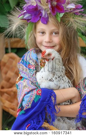 girl, young, cock, hand wreath green plant scarf outfit village
