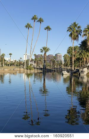 Phoenix downtown as seen across the lake in Encanto Park Arizona; Copyspace