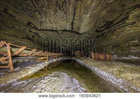 Abandoned varicoloured salt mine shaft tunnel carnallite