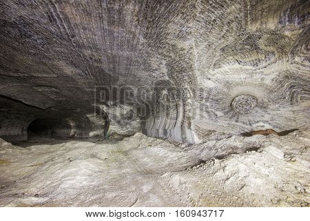 Abandoned varicoloured salt mine shaft tunnel carnallite