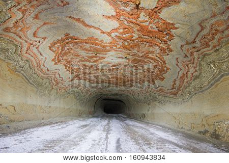 Abandoned varicoloured salt mine shaft tunnel carnallite