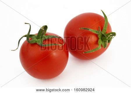 On white & copy space fresh healthy cherry tomatoes stock pictures