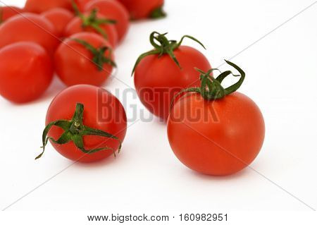 On white & copy space fresh healthy cherry tomatoes stock pictures