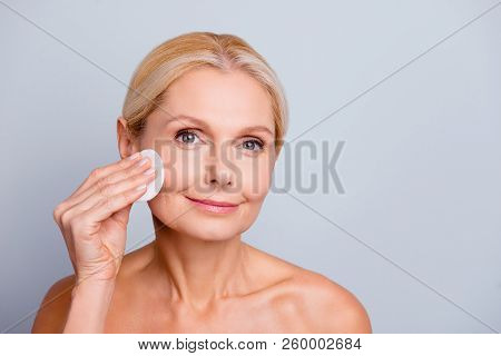 Portrait Of Pretty Charming Stylish Attractive Woman With Wrinkle Applying Lotion Using Cotton Pad C
