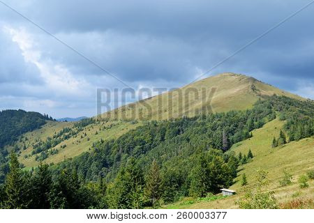 Mount Parashka In The Light Of The Sun Against The Cloudy Sky