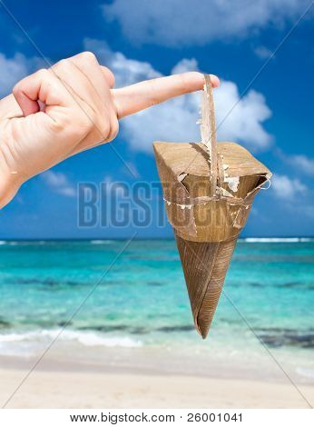 Traditional delicious sweet Cucuruchu, locally concocted blend of honey, mango, coconats, banana covered in palm leaves, Baracoa, Cuba