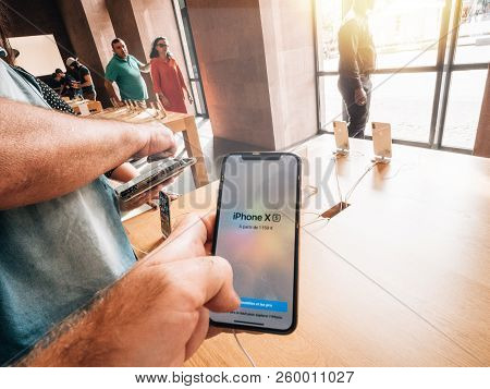 Strasbourg, France - Sep 21, 2018: Apple Store With Curious Customers People Hands Buying Holding Ad