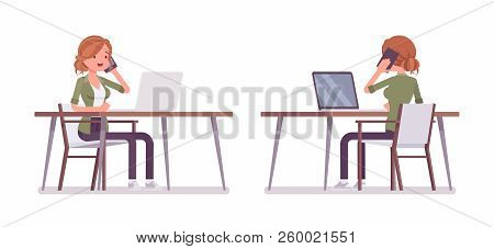 Young Red-haired Woman Sitting And Working At The Desk. Caucasian Attractive Girl With Ginger Hairst