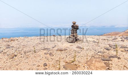 Several Small Stones Placed One On Another Standing In The Ruins Of The Greek - Roman City Of The 3r