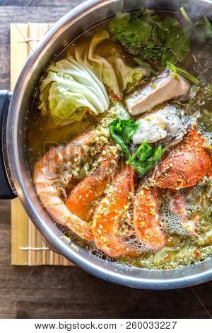Seafood spicy hot pot crab prawn fish squid tumyum