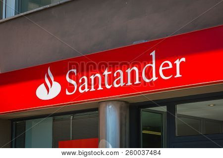 Barcelona, Spain - June 20, 2017: Facade Of An Agency Of The Spanish Banking Group Santander On A Su