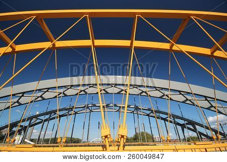 Bright Yellow Bridge Named Hogeweidebrug Over The Amsterdam-rhine Canal In Utrecht For Traffic And V