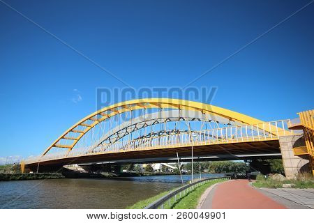 Bright Yellow Bridge Named Hogeweidebrug Over The Amsterdam-rhine Canal In Utrecht For Traffic And V