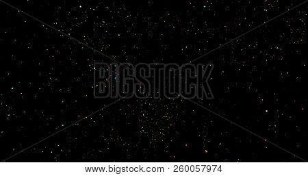 Flying Dust Particles On A Black Background