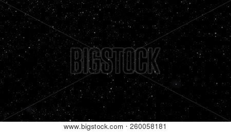 Flying Dust Particles On A Black Background