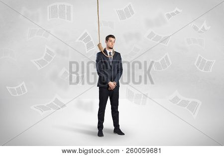 Young burnout businessman with flying documents concept