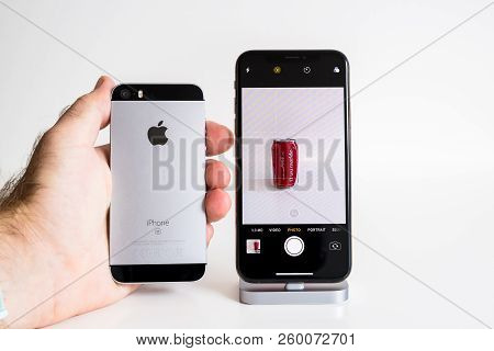 Paris, France - Sep 25, 2018: Male Hand Compare New Iphone Xs And Xs Max Smartphone Model By Apple C