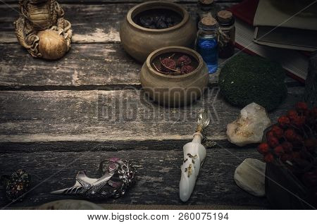 Magic Potion Preparation On The Table Of Magician. Witchcraft Or Druidism Concept Background.