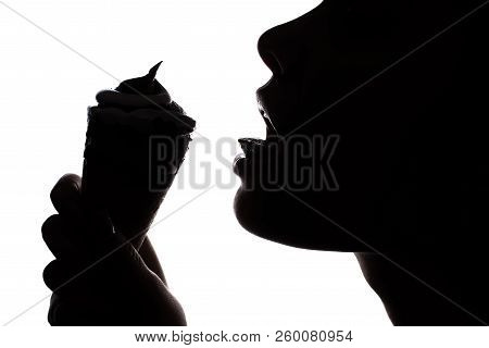 Crispy Candy Cacao Arm Big Bite Concept. Side Half-faced Close Up Portrait Of Attractive Alluring Wo
