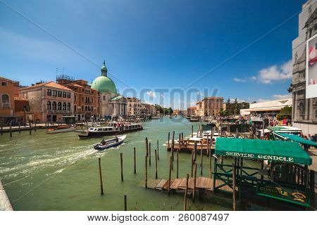 VENICE, ITALY - JUNE 15, 2016 View to Grand Canal from  bridge Ponte degli Scalzi on bright sunny day