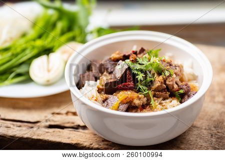 Northern Thai Food (kanom Jeen Nam Ngeaw) With Vegetables On Wooden Background,spicy Rice Noodles So