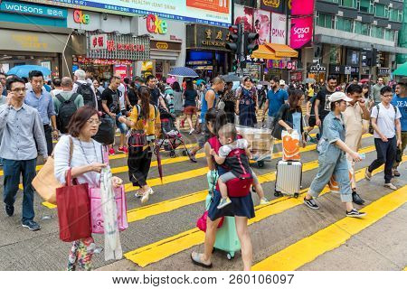 Tsim Sha Tsui, Hong Kong, 17 August 2018-: People crossing the road in Hong Kong