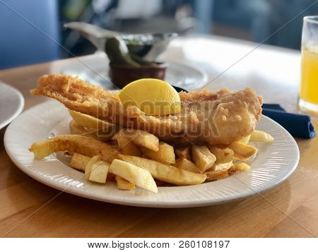 Classic restaurant dish of English Fish and Chips