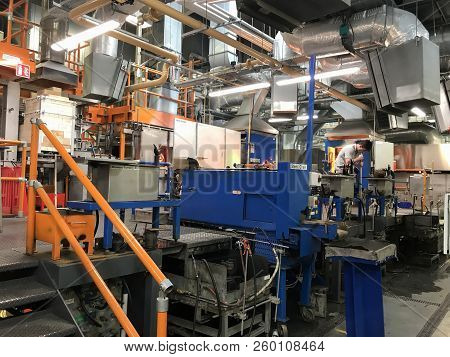 Man Maticulously Works On Glassblowing And Shaping  In The Factory Of House Of Waterford Crystal Fac