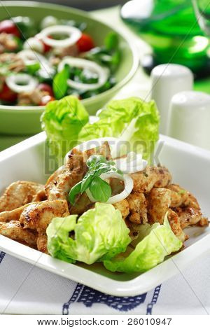 Chicken stripes with salad