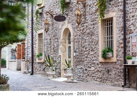 Borghetto, Verona, Italy - May 16, 2018: Street of medieval village of Borghetto, Italy