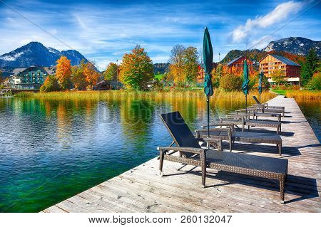 Picturesque Autumn Scene Of Altausseer See Lake. Sunny Morning View From Cozy Resting Place. Locatio