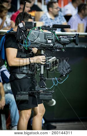 VALENCIA, SPAIN - SETEMBER 19: Steadycam operator during UEFA Champions League match between Valencia CF and Juventus at Mestalla Stadium on September 19, 2018 in Valencia, Spain