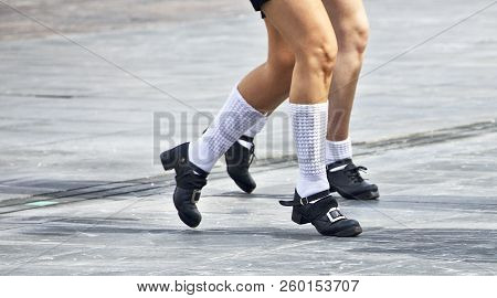 Female Legs Of Irish Dancers On The Stage Closeup