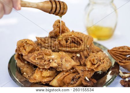 Close-up Of The Eastern Dessert Honey Baklava. Homemade Baklava Dessert On A  Plate