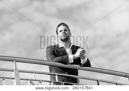 Man In Formal Wear Stand On Cloudy Blue Sky. Confident Businessman Outdoor. Looking To The Future. T