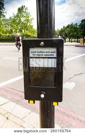 London, Uk - June 9, 2015: Crosswalk Button For Pedestrian With Light Warning. London. Uk
