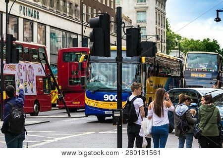 London, Uk - June 9, 2015: Tourists And Customers Near Primark Clothing Store On Oxford Street In Lo