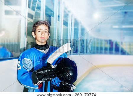 Ice Hockey Player Resting Between Game Periods