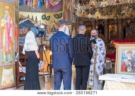 Tiberias, Israel, September 22, 2018 : A Priest Reads A Prayer At The Wedding Ceremony Held In The O