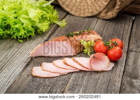 Veal Roast With Vegetables. Organic Products On A Wooden Table