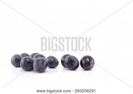 Fresh Black Grapes On White