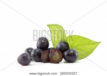 Fresh Black Grapes On White