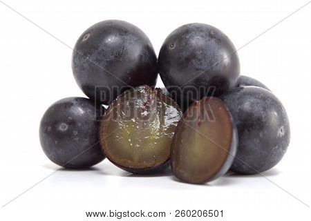Fresh Black Grapes On White