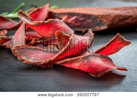 Armenian Basturma. Beef Cured And Spice. Organic Products On A Wooden Table